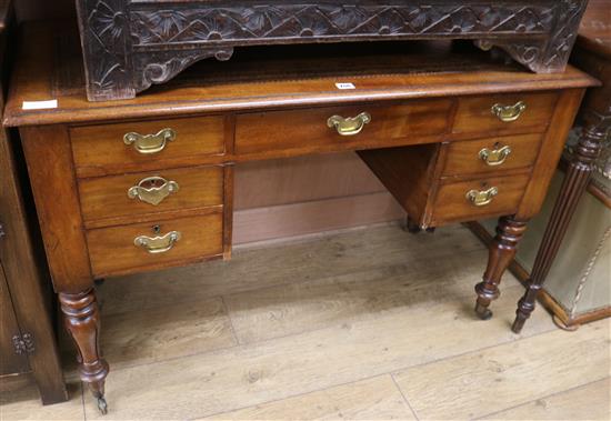 A Victorian mahogany kneehole desk W. 117cm